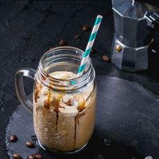 Starbucks style drink a jar type glass with straw